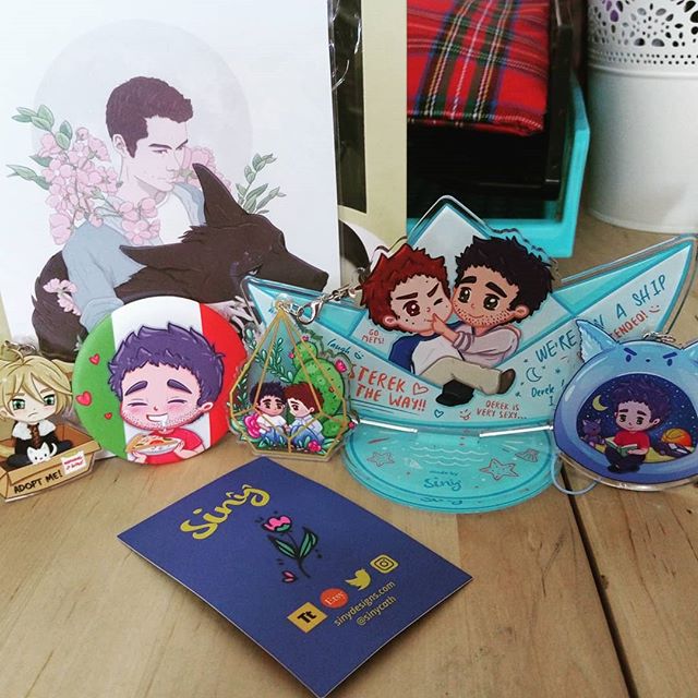 My latest order from @sinycath  much stereky goodness and one lil cranky russian boy.  Also the precious Tyler enjoying pizza badge.....LOVE IT!! #sterek #ternwolf #yuriplisetsky #yurionice #fangirlpurchases